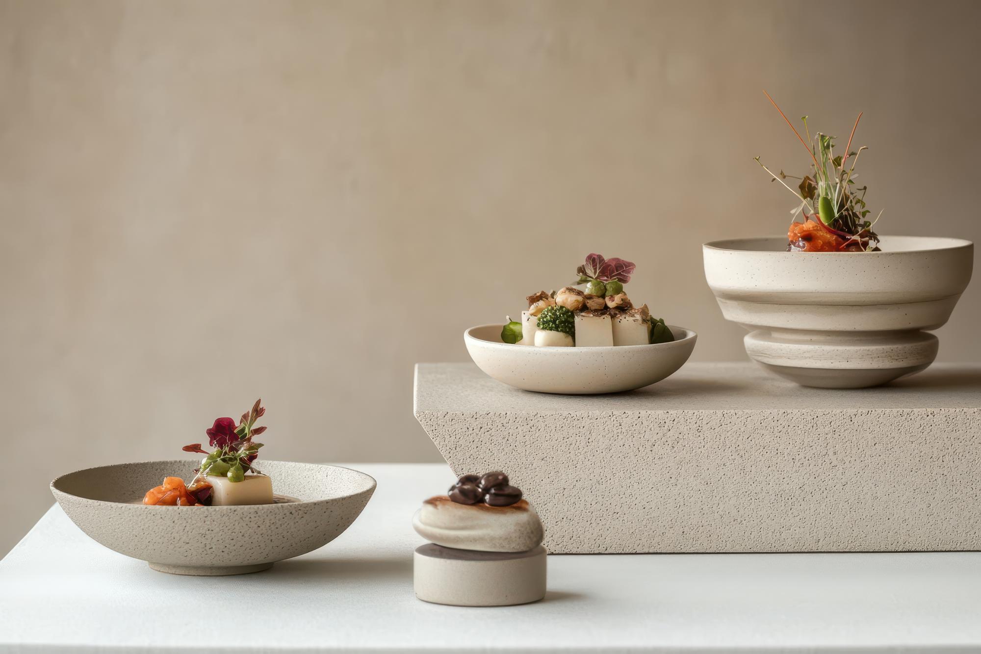 Selection of plated dishes in neutral styling